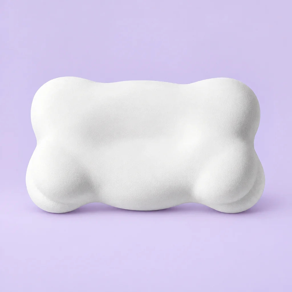 White Nestora pillow on a soft lavender background